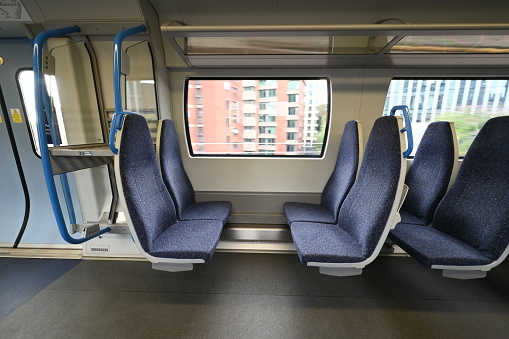Empty passenger seats on an English train.