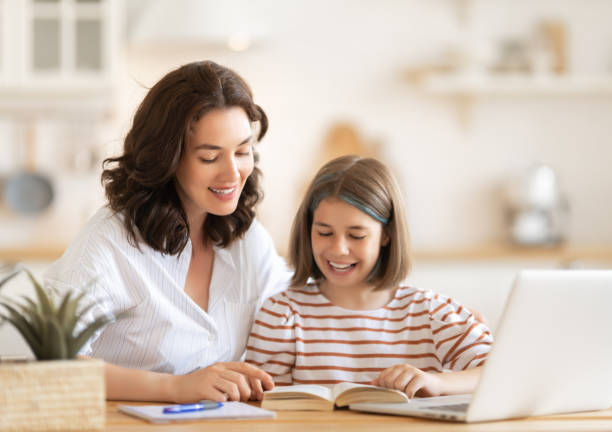 istock Girl doing homework or online education. 1334218196