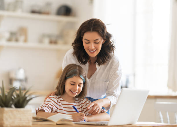 istock Girl doing homework or online education. 1334218280