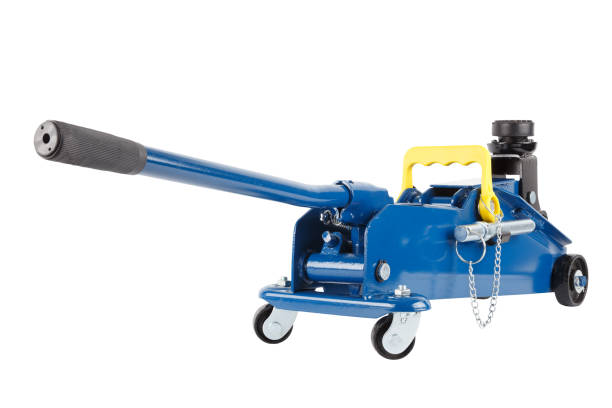 istock blue hydraulic car jack isolated on white background, lowered 1334218952