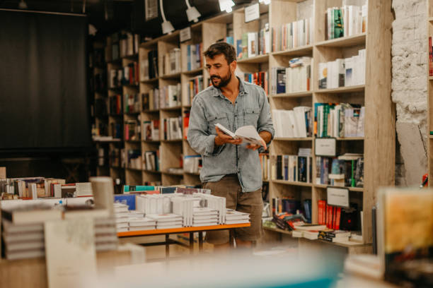 istock Doing my research in the bookstore 1334220569