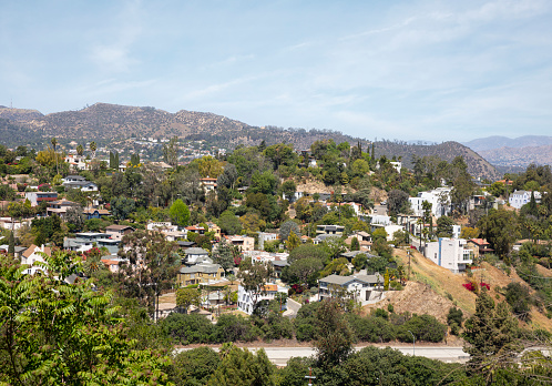 View of rooftops, mountains, and residential area of Silver Lake neighborhood in Los Angeles