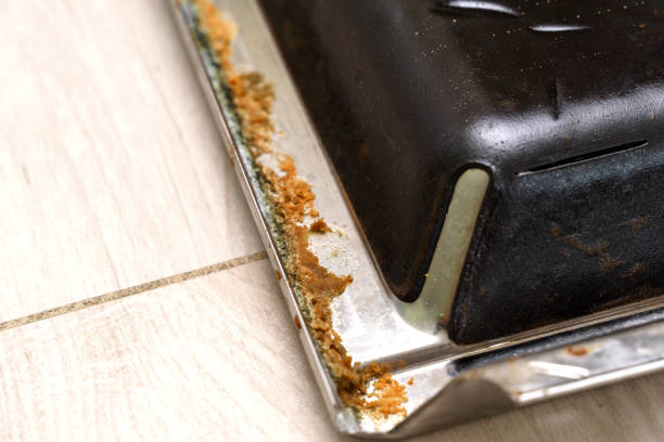 istock removed dishwasher door with grease. breakdown of kitchen appliances 1334224288