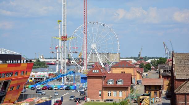 crane in an industrial port . cargo port. - industry szczecin europe nautical vessel imagens e fotografias de stock