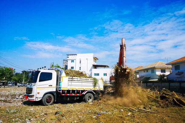 istock Makro is adjusting the soil in the construction preparation area. 1334239534