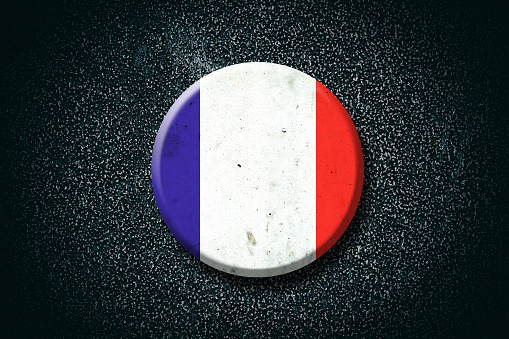 French flag. Round badge, on a dark background. Signs and Symbols. Flags.