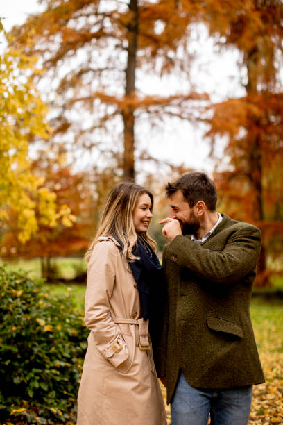 istock Young couple in the autumn park 1334241761