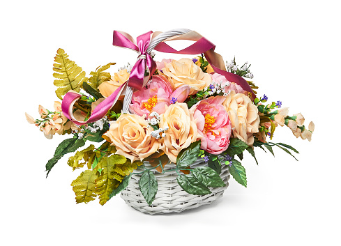 Flower arrangement in a vase in the form of an basket. Composition