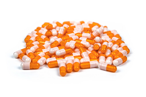Medicine capsules on white background