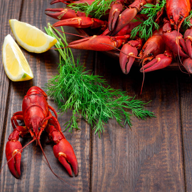 istock Crayfishes on a plate served with dill and lemon 1334243478