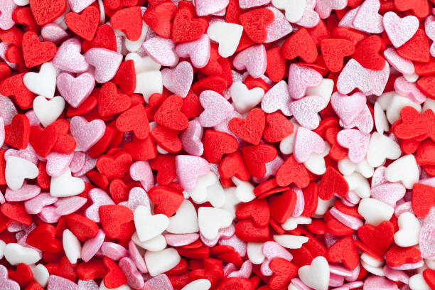 istock red and white sweet heart shaped candies 1334246027