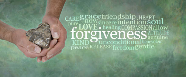 Love and Forgiveness Word Tag Cloud male hands gently cupped around a wooden heart beside a  FORGIVENESS word cloud against a wide rustic green grunge background kurma stock pictures, royalty-free photos & images