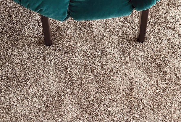 istock New carpet and green chair 1334249577