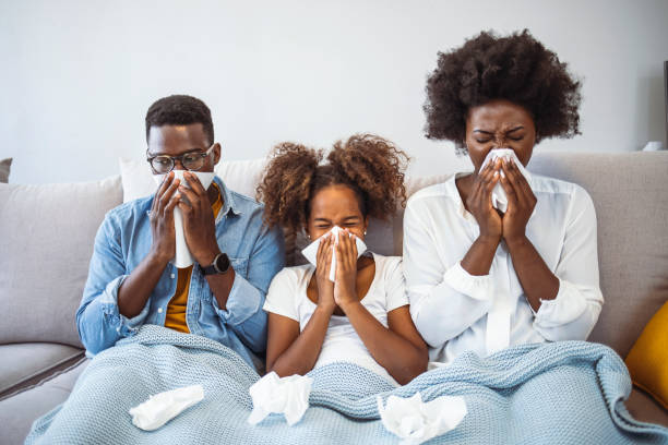 istock Sick family on bed. 1334249952