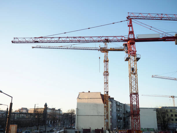 istock Big hoisting crane standing at blue sky 1334251278