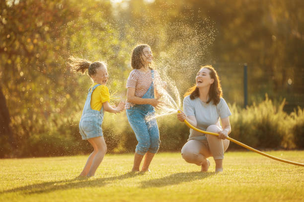istock Happy family playing in backyard 1334253232
