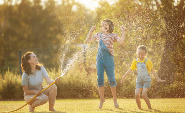 istock Happy family playing in backyard 1334253235