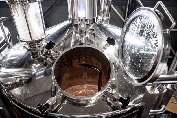 istock Craft beer brewing equipment in privat brewery 1334254191