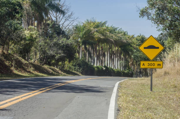 istock 300 meter spine, written on a sign that is on a road, copy space on the left 1334254778