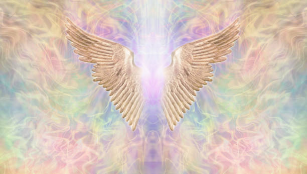Golden Angel Wings Message Banner Wide wispy multicoloured ethereal background with a pair of golden Angel Wings in the centre with a shaft of bright light between and copy space both sides pics of guardian angels stock pictures, royalty-free photos & images