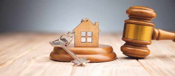 istock Judge gavel and house key 1334261075