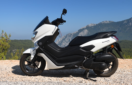 Turkey, Kemer 18.07.2021:Scooter white Yamaha NMAX 155 model 2020. The scooter is parked in the mountains of Turkey.