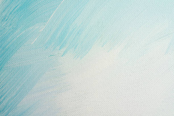 istock Abstract background. Canvas covered with white paint with shades of blue 1334264704