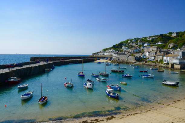 istock Mousehole village harbour, Penzance, Cornwall, UK 1334266061