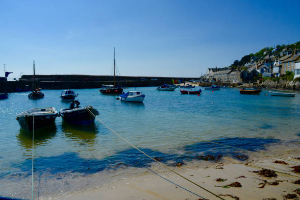 istock Mousehole village harbour, Penzance, Cornwall, UK 1334266084