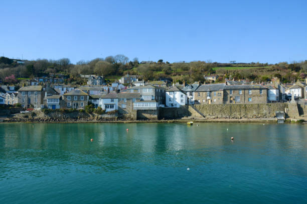 istock Mousehole village harbour, Penzance, Cornwall, UK 1334266136