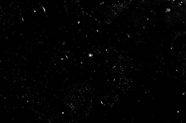 dust particles and scratches on a black background for use with the screen overlay mode