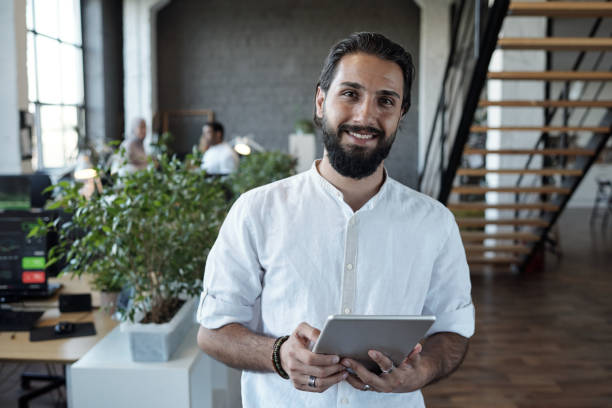 istock Successful young Muslim businessman with digital tablet 1334268664