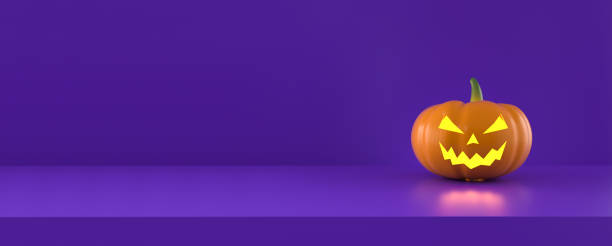 istock Halloween pumpkin with lights on panoramic purple studio background. 1334272002