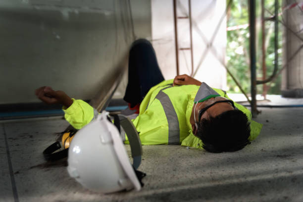 istock Accident at work of construction worker at site. Builder accident falls scaffolding on floor, Electric suction, Unsafe in work concept. Add zoom filter effect for feelings. 1334272819