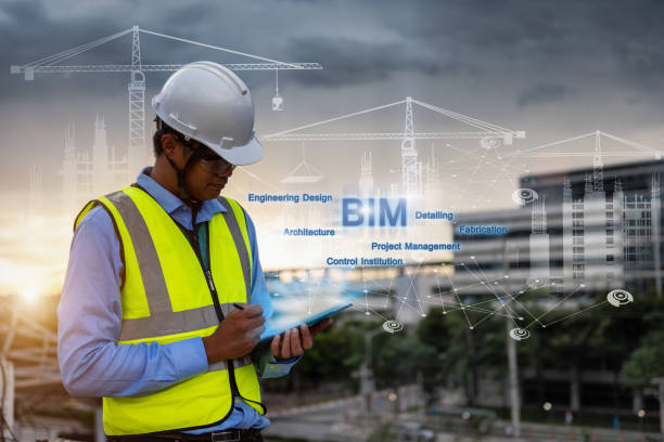 istock Engineering Consulting People on construction site holding tablet in his hand. Management in business workflow and Building inspector with BIM technology in Construction Project. 1334272871