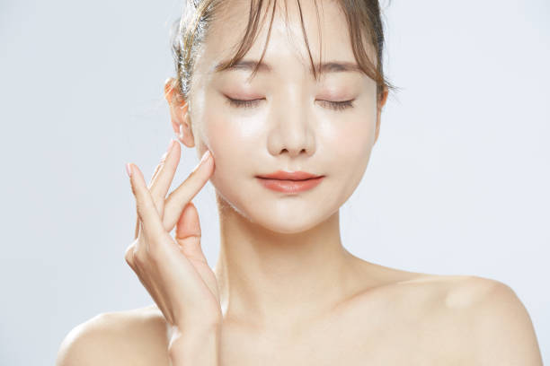 Beauty concept portrait of young Asian woman with soft highlighting Flash light body care and beauty stock pictures, royalty-free photos & images