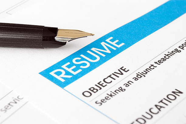 Resume Close-up of resume with pen good cv stock pictures, royalty-free photos & images