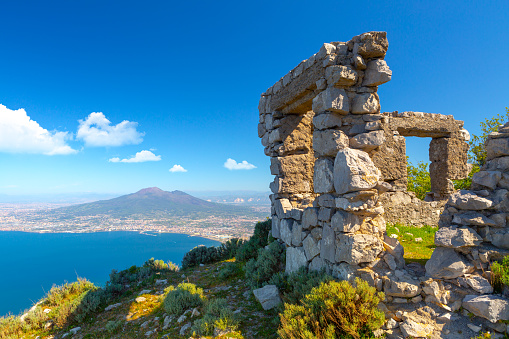 Ruins on the background of Vesuvius and the city of Naples. Italy, Campania. High quality photo