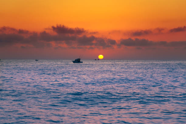 Mediterranean sea sunrise sunset with sun in red sky