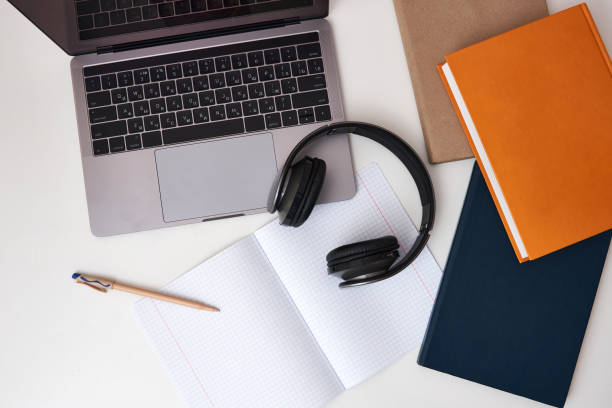 istock Flat lay composition with headphones, laptop and copy space 1334280261