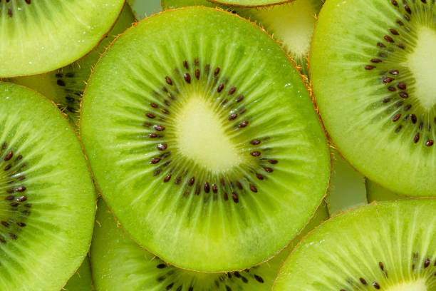 istock Kiwi Macro,slice of kiwi fruit on a full frame. horizontal format 1334280754