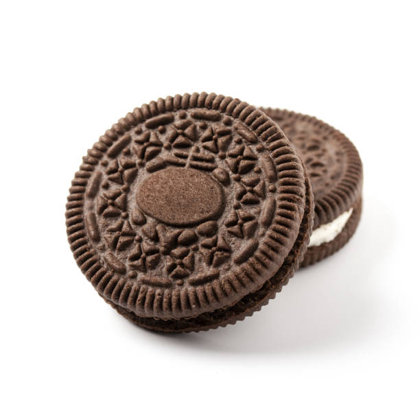 istock two sandwich chocolate cookies with cream isolated on white background 1334281463