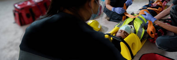 istock First aid for injuries in work accidents. Using first aid equipment supports loss of feeling or loss of normal movement and Loss of function in limbs. Banner with copy space. 1334282010