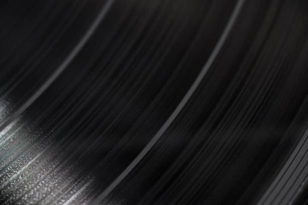 istock Black vinyl plate close-up. 1334282095