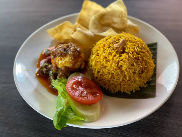 istock A set of Curry chicken biryani rice with crispy pappadom 1334283875