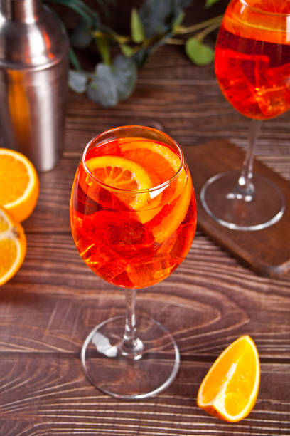 istock Spritz Italian cocktail alcoholic beverage with ice cubes and oranges. 1334287190