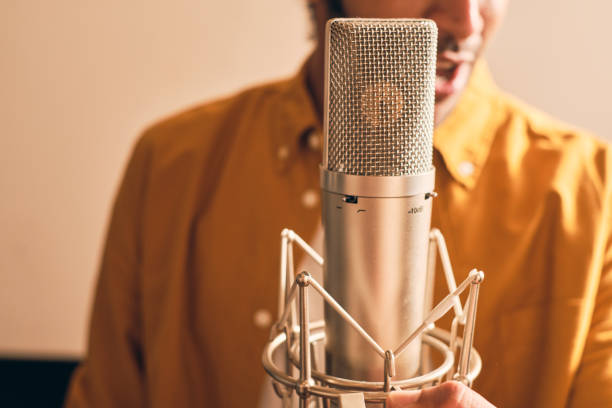 istock Man singing in the music studio 1334287257