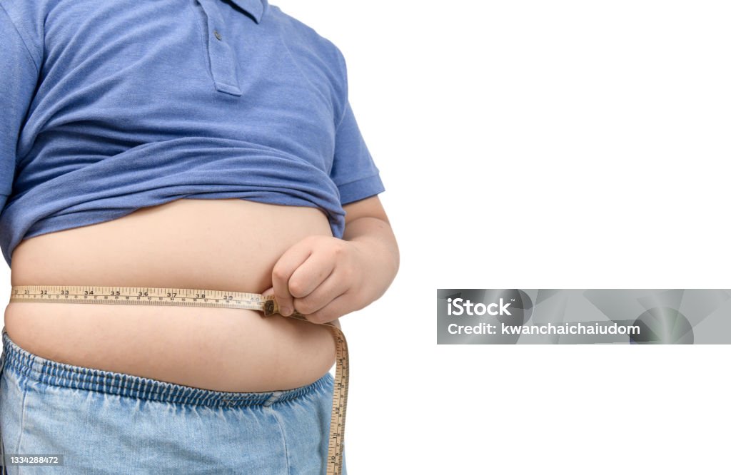 obese fat boy measuring tape of stomach isolated on white obese fat boy measuring tape of stomach isolated on white  background, healthy and lose weight concept Overweight Stock Photo