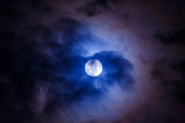 istock Mysterious dark night sky with full moon and cloud. Dark space moon and midnight Halloween concept 1334289804