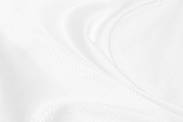 istock Clean fashion woven beautiful soft fabric abstract smooth curve shape decorative textile white background 1334289975